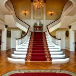 hotel with grand stairs in the middle of hall