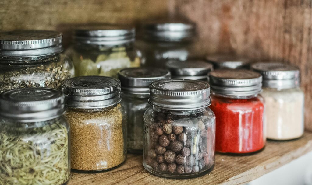 food ingredients stored in jars and kept on shelving