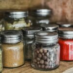 food ingredients stored in jars and kept on shelving